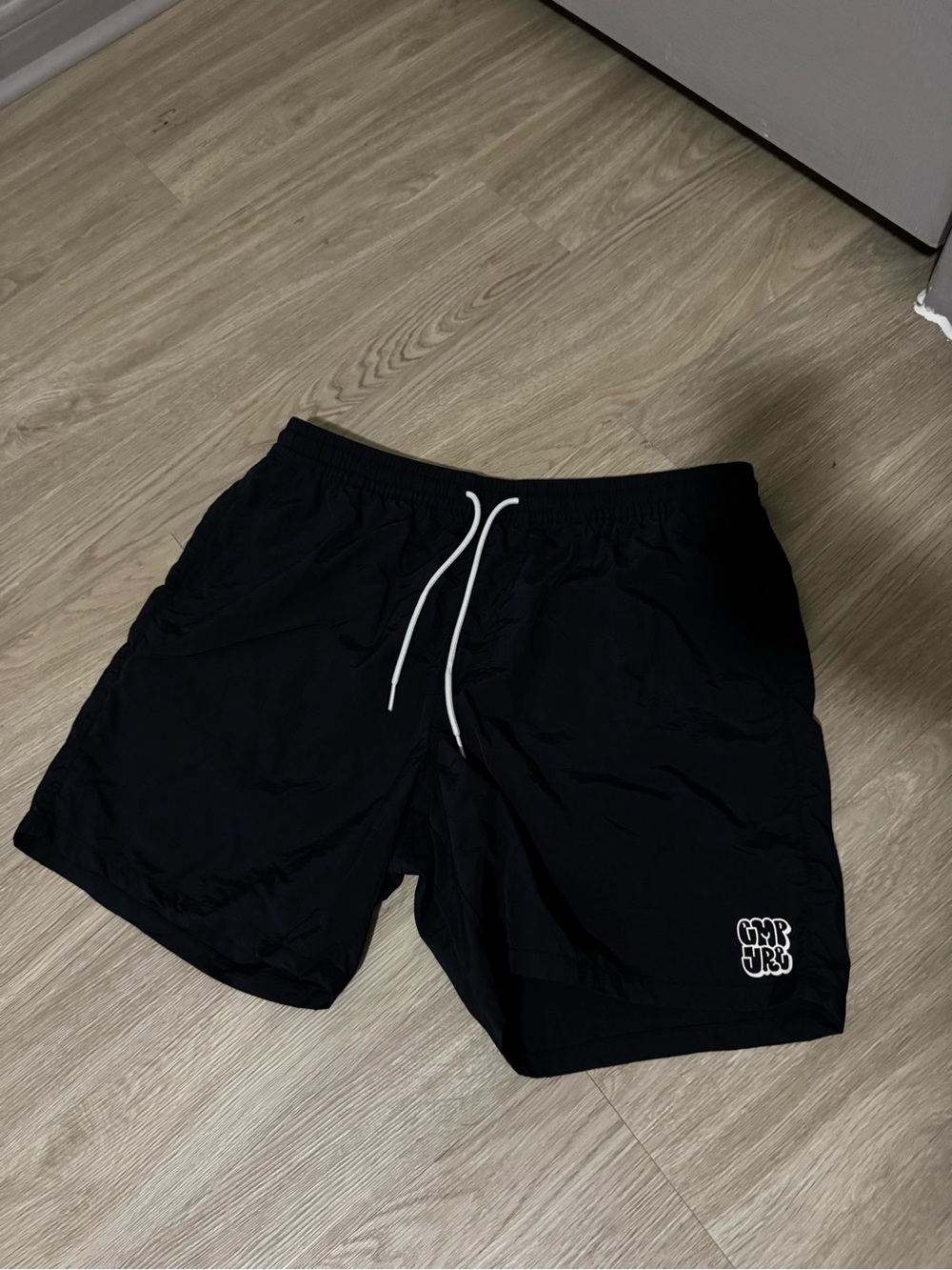Black Swim Shorts with White Drawstring and Logo